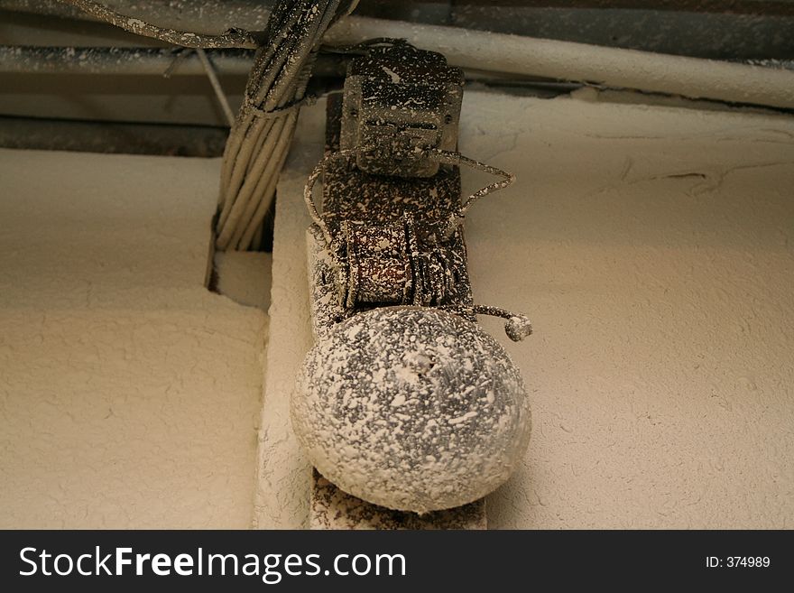 An extremely time-worn rusty fire alarm. An extremely time-worn rusty fire alarm.