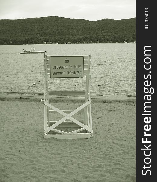 No Lifeguard on Duty sign on Lake george, New York.