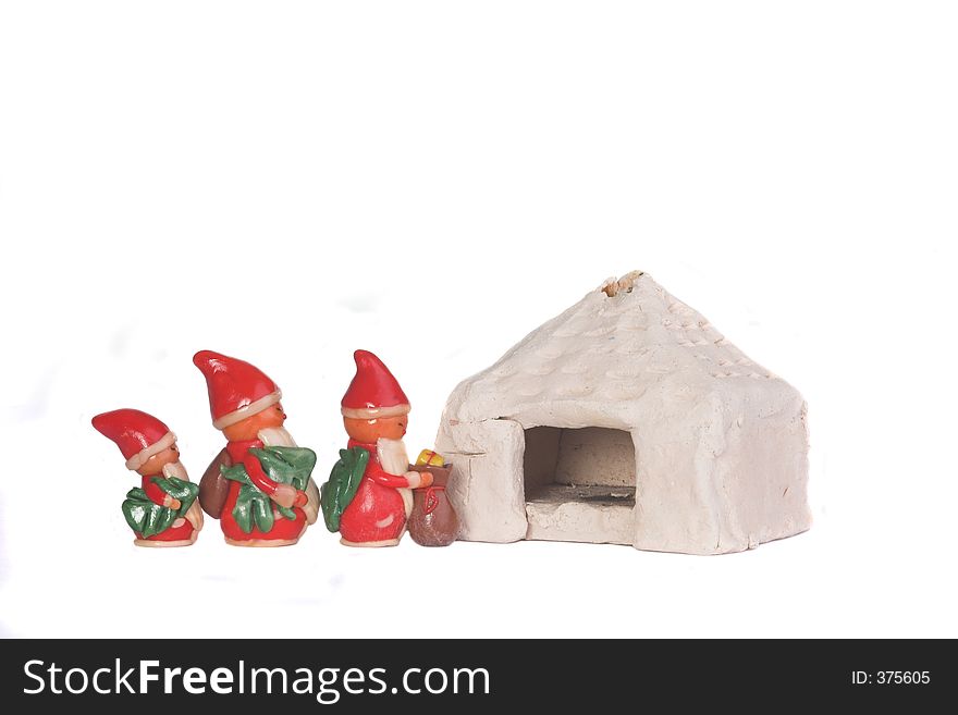 Three Santas are going to her bakery; no property/copyright release necessary. Three Santas are going to her bakery; no property/copyright release necessary