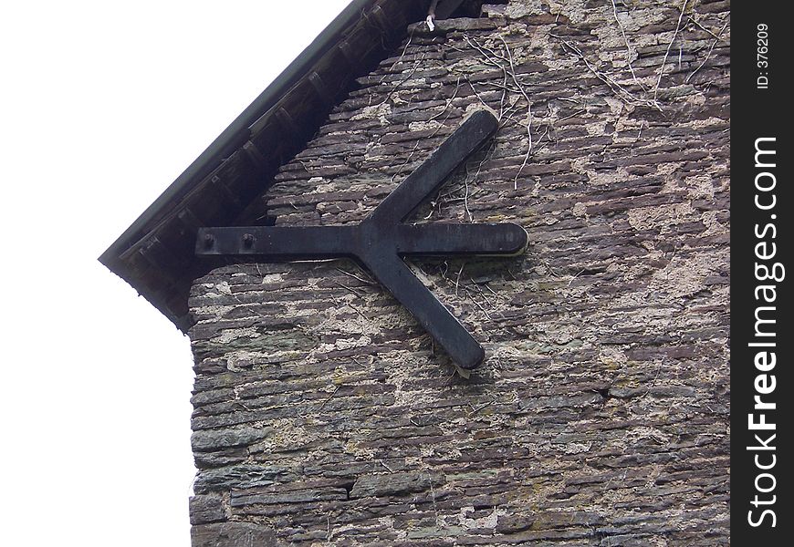 Metal tie on barn at Llanvihangel Court, Pandy, Wales. Metal tie on barn at Llanvihangel Court, Pandy, Wales