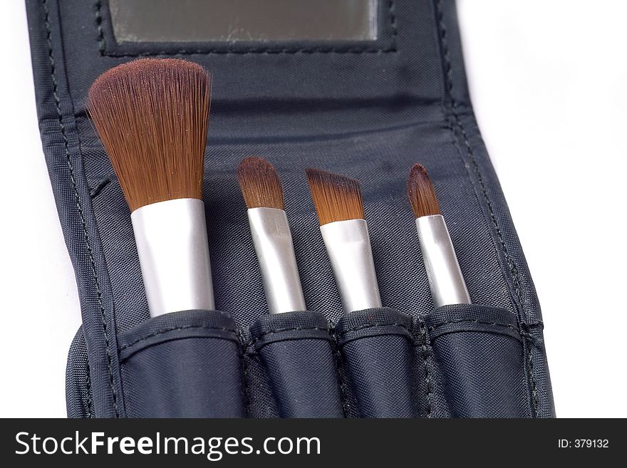 Four beauty brushes