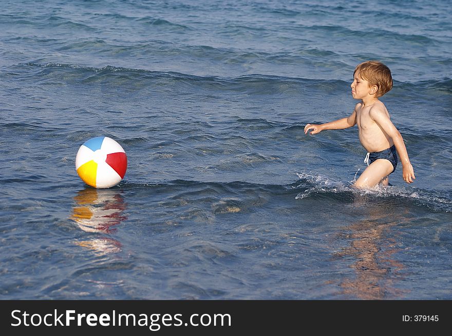 Kid playing in the water. Kid playing in the water