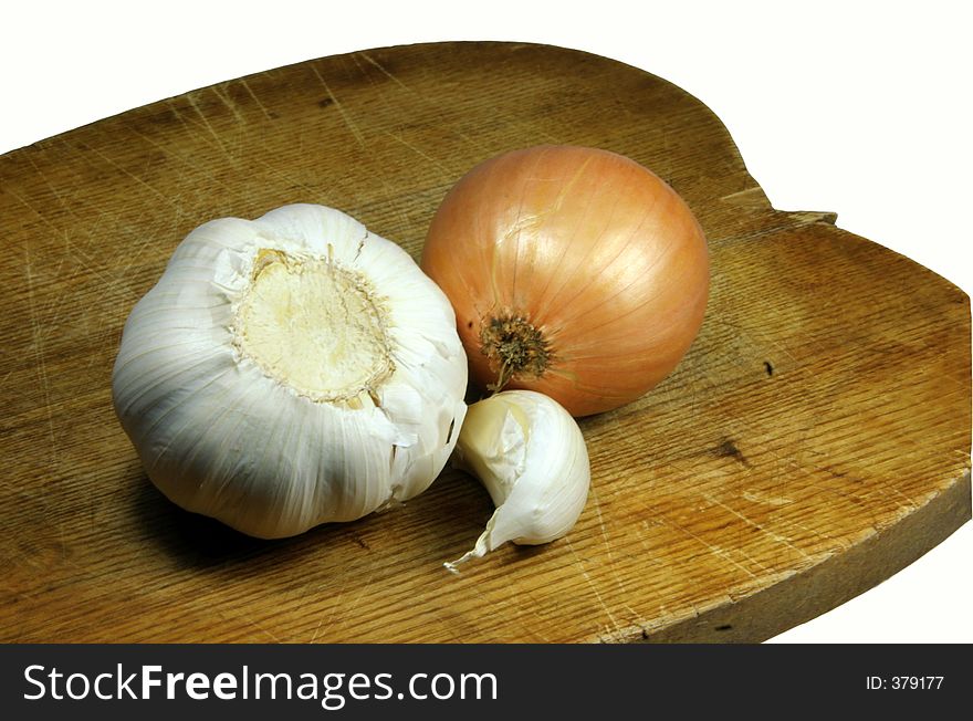 Garlic and onion on a cutting board