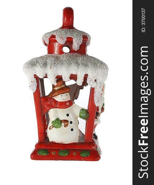 Christmas toy. A toy on a fur-tree with porcelain snowman