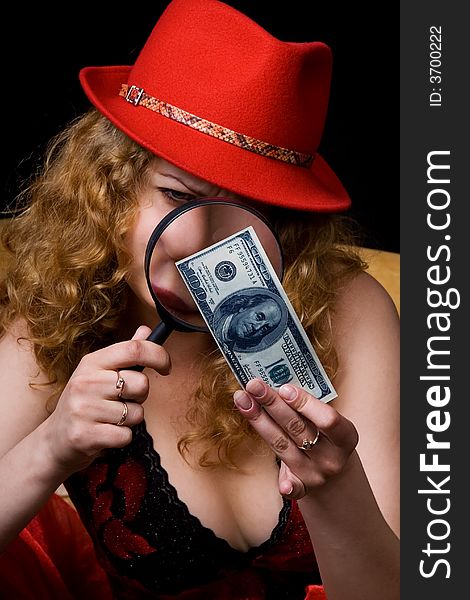 The beautiful woman checks money