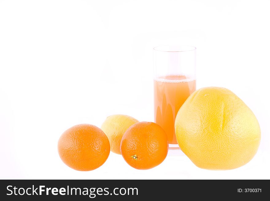 Lemon, orange, grapefriut and juice isolated on white. Lemon, orange, grapefriut and juice isolated on white