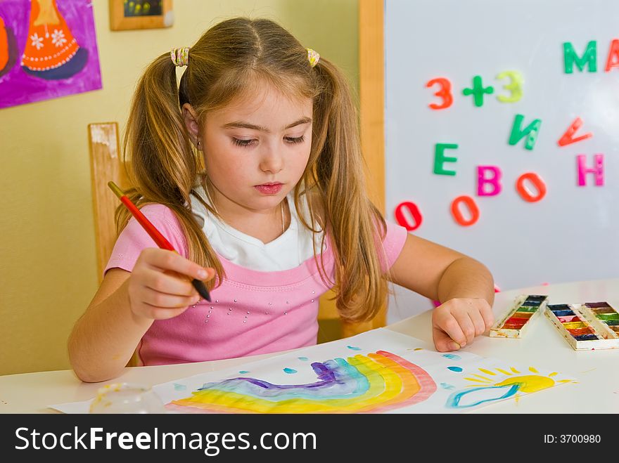 Schoolgirl Has Drawn A Rainbow