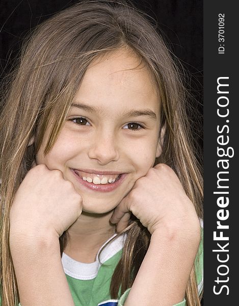 Cute caucasian american girl resting head on the hands. Cute caucasian american girl resting head on the hands