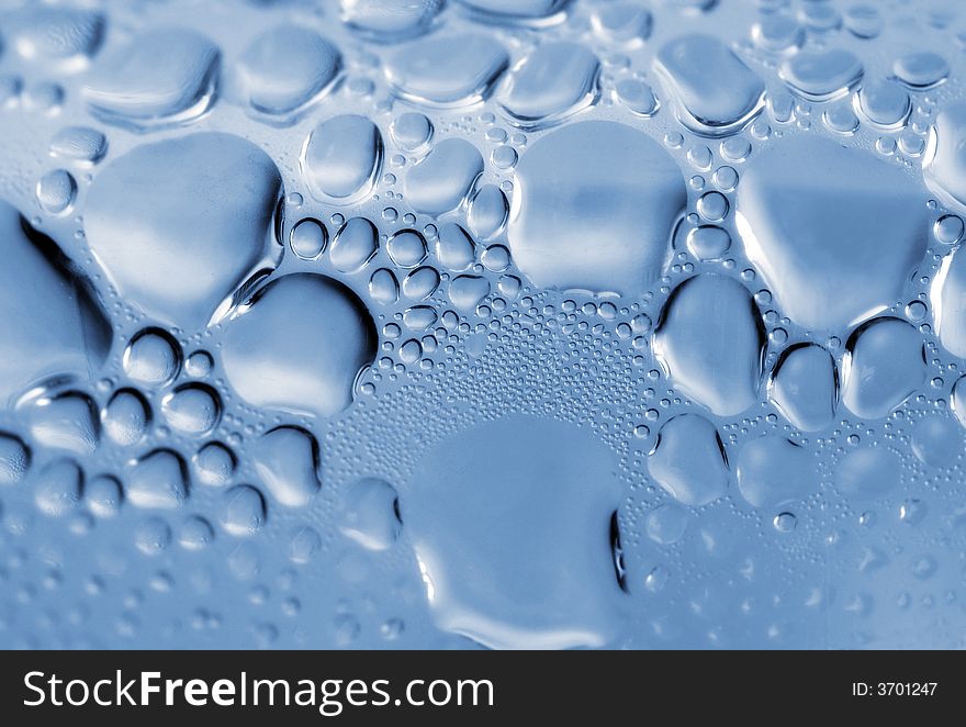 Water drops on shiny surface after rain storm