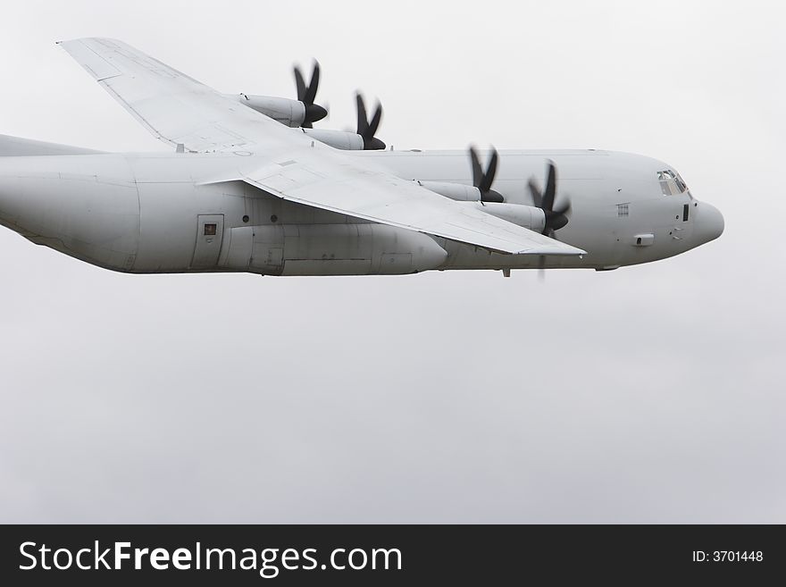 Military transport aircraft (Hercules) in flight. Military transport aircraft (Hercules) in flight