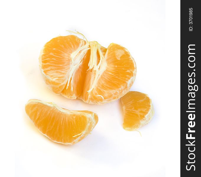 Peeled tangerine unsegmented in white background. Peeled tangerine unsegmented in white background