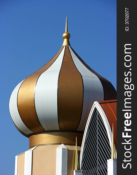 Modern gold dome with white stripes