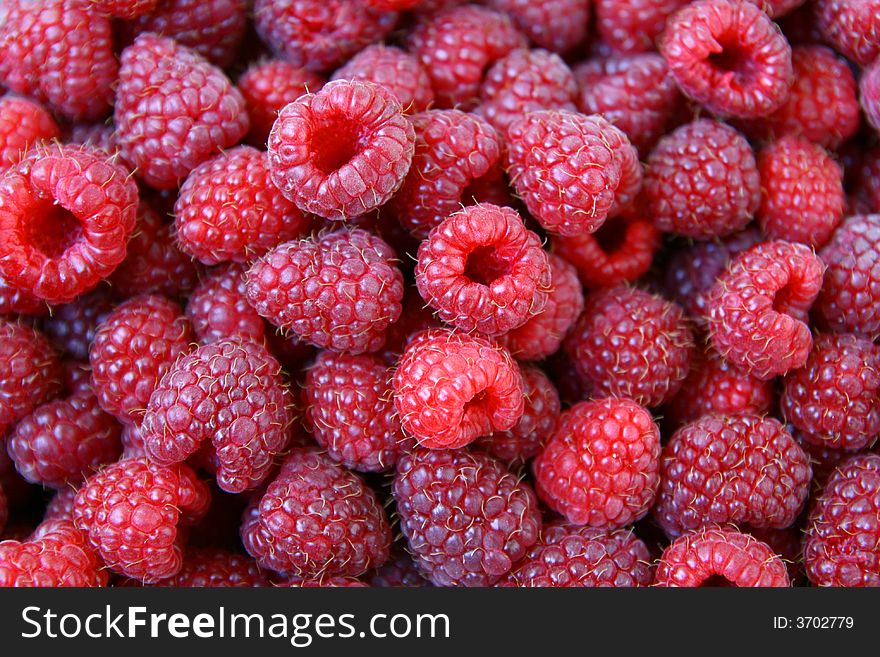 Sweet red raspberries texture, Rubus idaeus, natural background