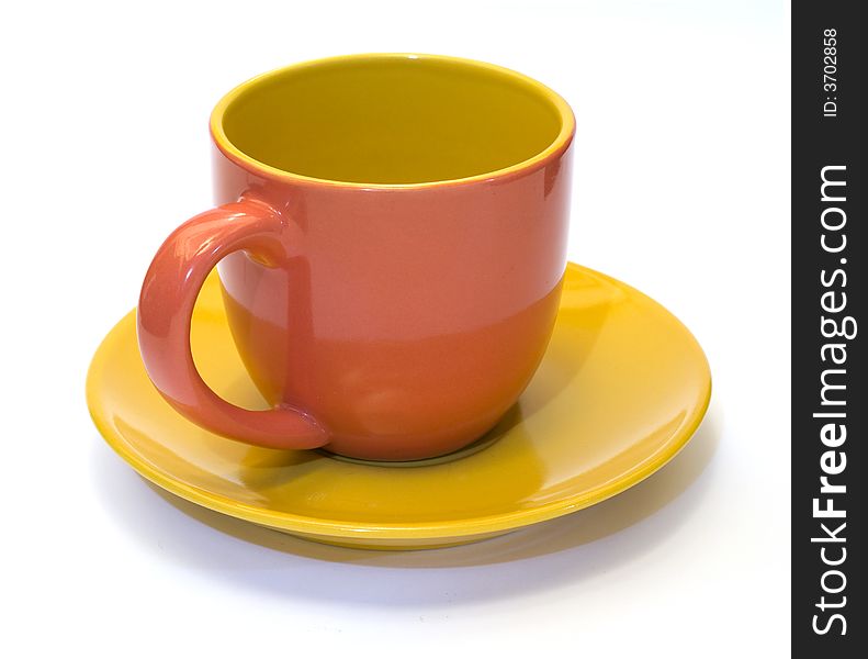 Glazed pottery coffee cup and saucer 1