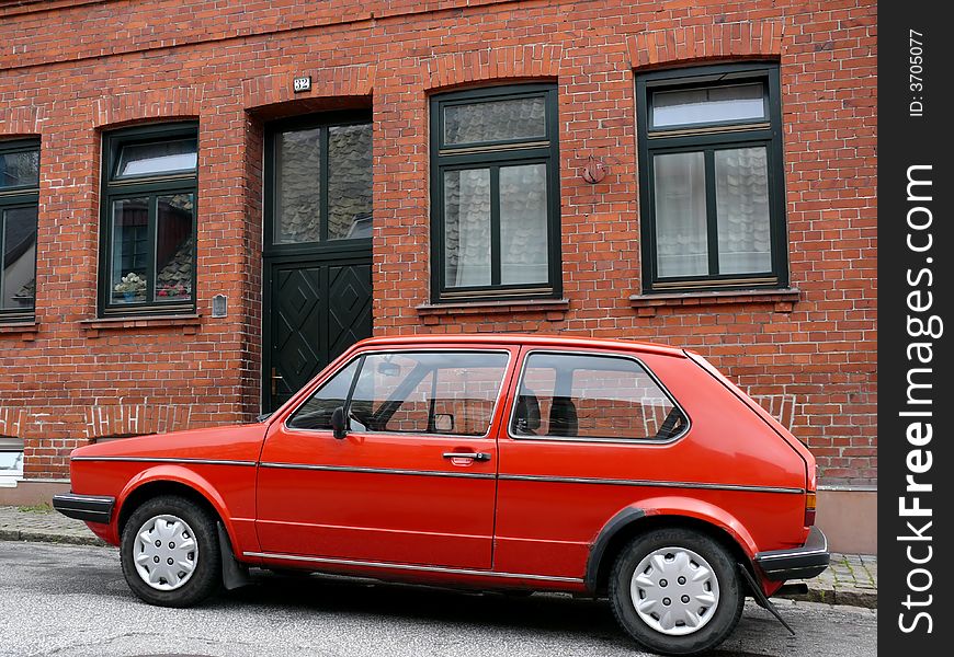 Portrait of old sport car and house. Portrait of old sport car and house