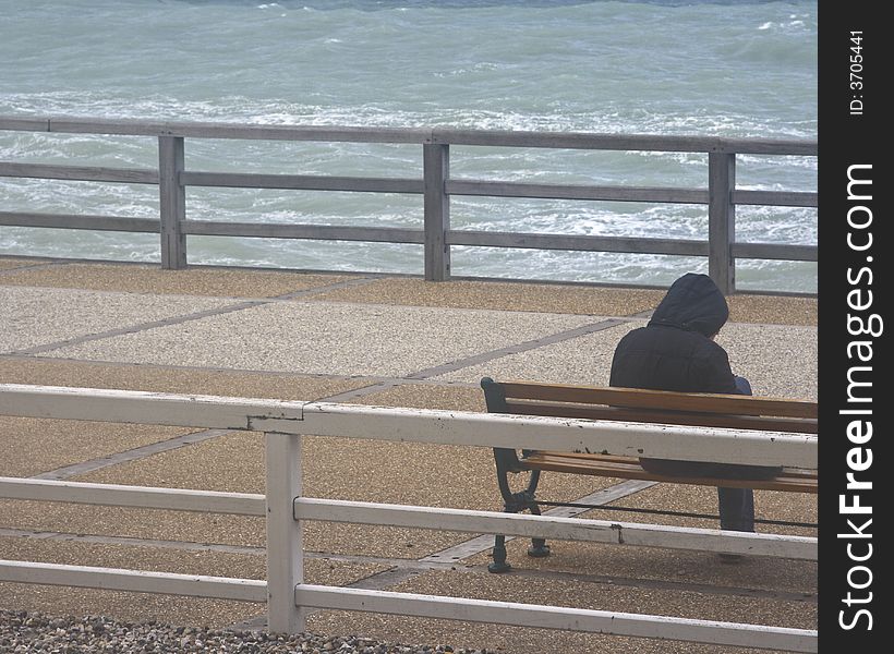 Sitting alone along the coast of France  time for reflection. Sitting alone along the coast of France  time for reflection