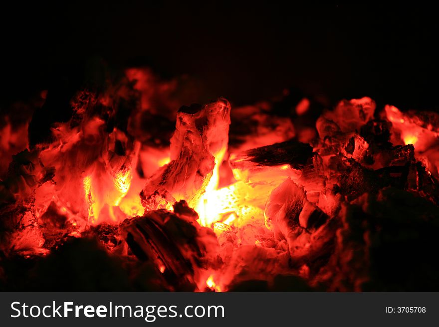 Fire time... firewood in fireplace... red and black place