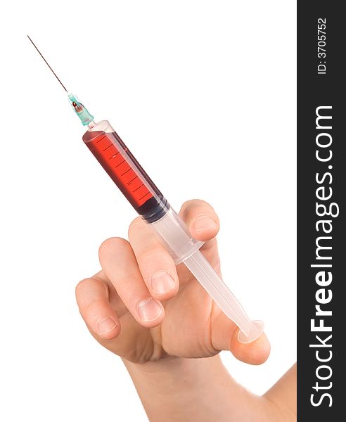 Hand and syringe with blood on a white background. Hand and syringe with blood on a white background