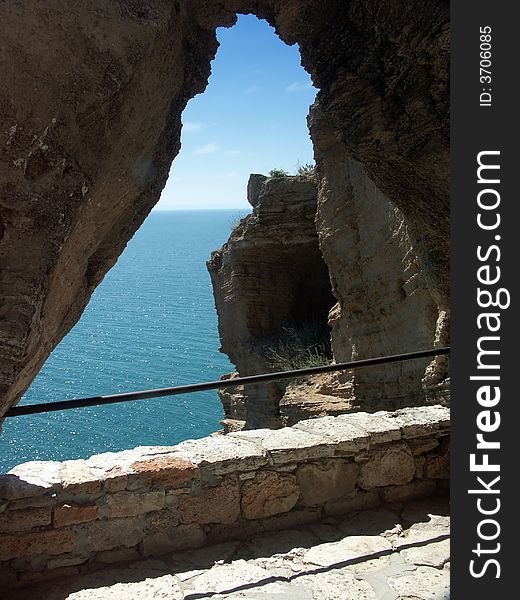 Stone arch and sea