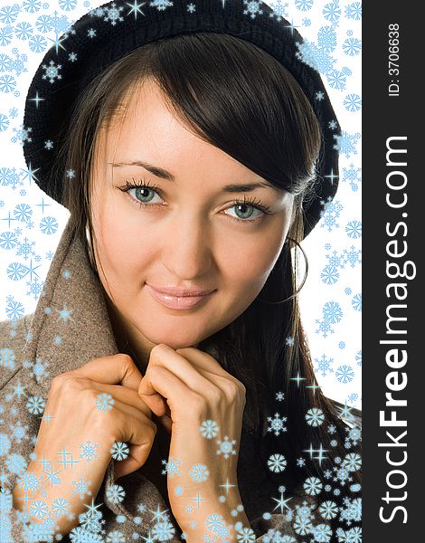 Girl  in outer clothing  beret and snowflake