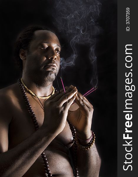 Portrait of afroamerican man in meditation - isolated on black. Portrait of afroamerican man in meditation - isolated on black