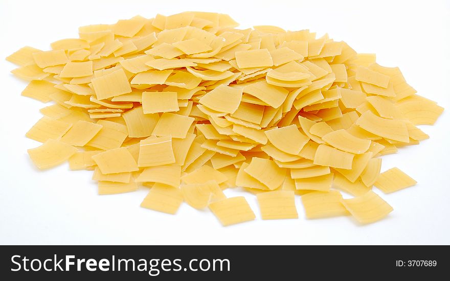 Mountain of noodles (pasta, macaroni), on white background