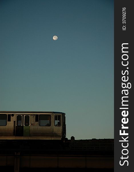 Moon over train