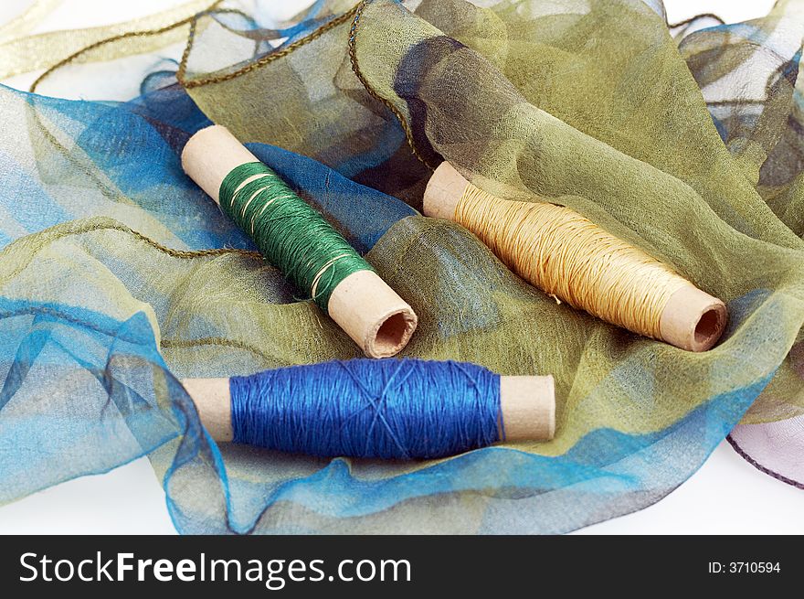 Beautiful green blue silk scarf and matching threads, sewing kit. Beautiful green blue silk scarf and matching threads, sewing kit