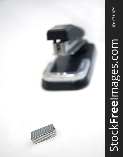 Black Stapler On White Background.