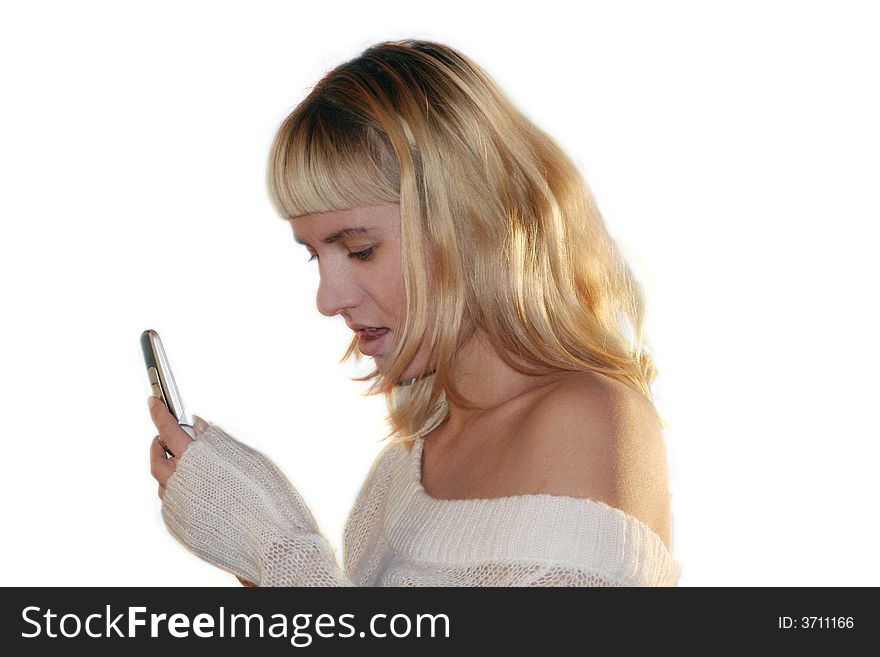 Young blond woman sms by mobile pho