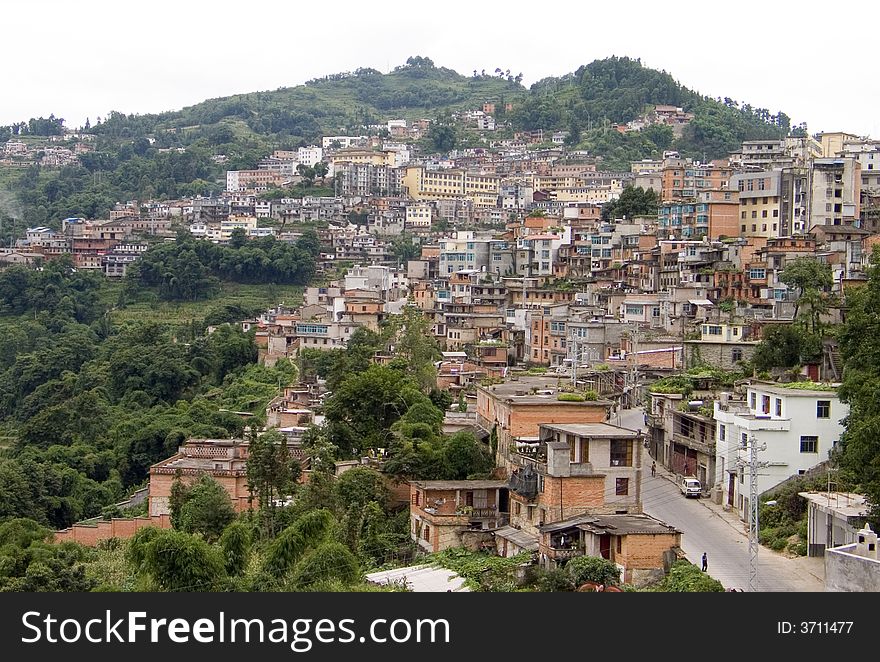 A small town extended along the hillside in southwest China. A small town extended along the hillside in southwest China