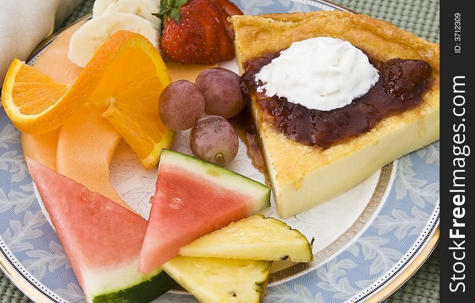 A wonderful healthy breakfast lots of fresh fruit on a nice plate