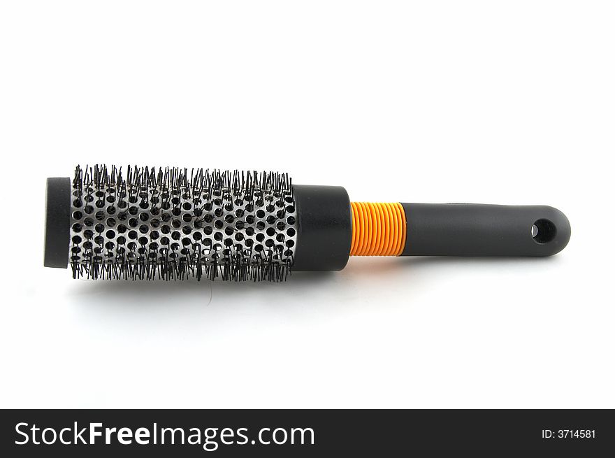 A rigid hairbrush for long hair