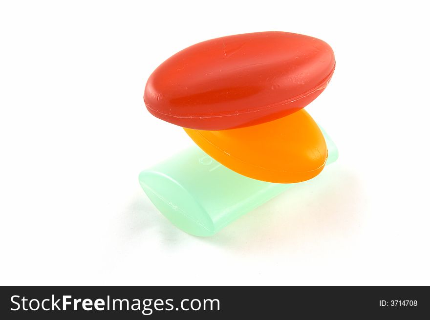Multi-coloured soap on a white background