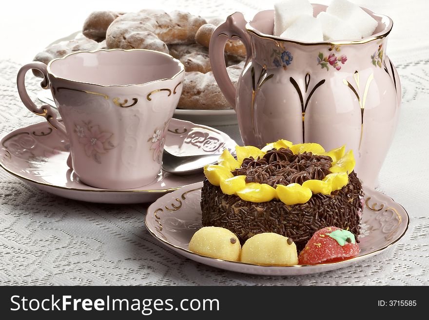 Breakfast with cake and tea on the table