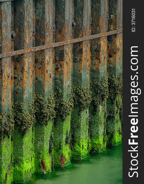 A colorful dock from the water side at low tide. A colorful dock from the water side at low tide