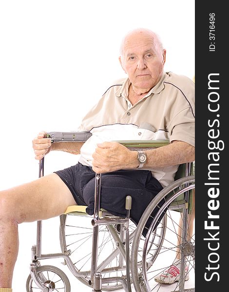 Eldery man in wheelchair vertical isolated on a white background