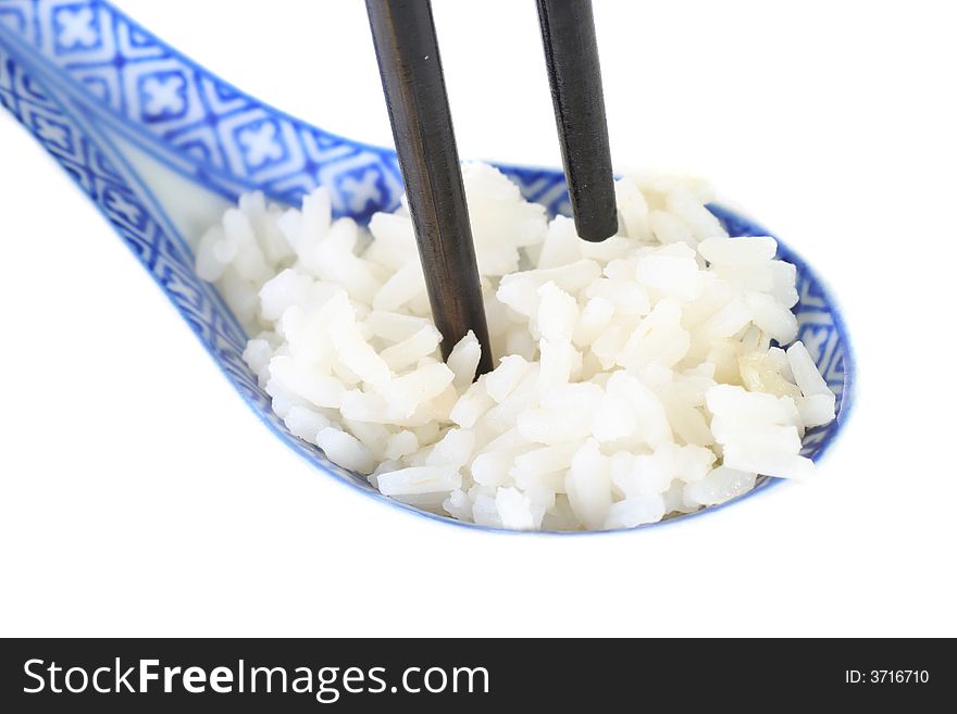 Chopstick and rice isolated on white. Chopstick and rice isolated on white