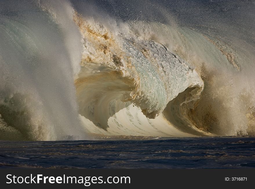 Giant wave breaking on the north shore of oahu. Giant wave breaking on the north shore of oahu