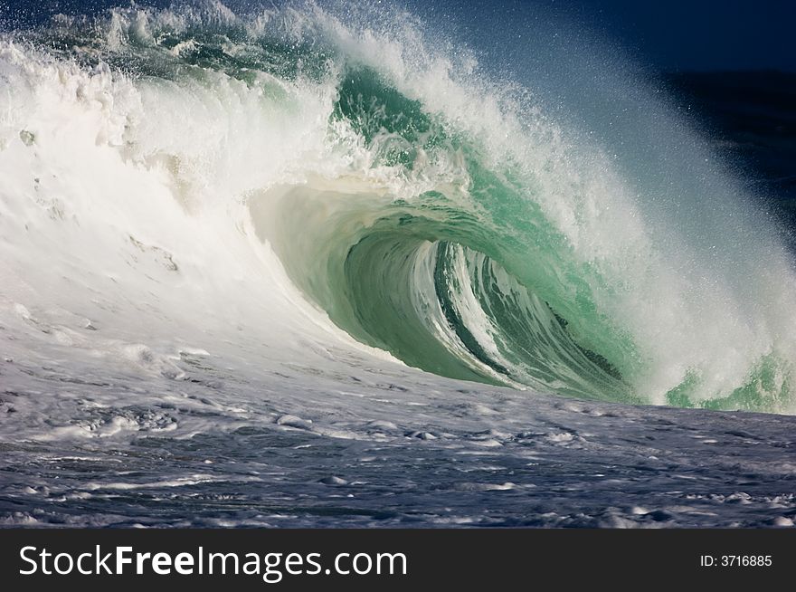 Giant wave breaking on the north shore of oahu. Giant wave breaking on the north shore of oahu