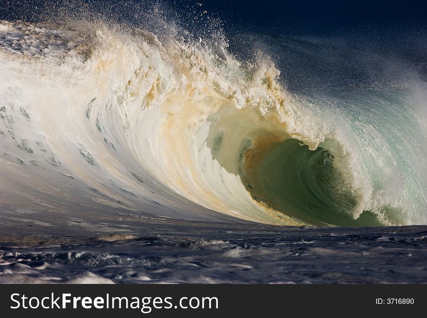 Giant wave breaking on the north shore of oahu. Giant wave breaking on the north shore of oahu