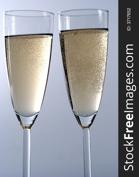 Wineglass of champagne isolated in white background