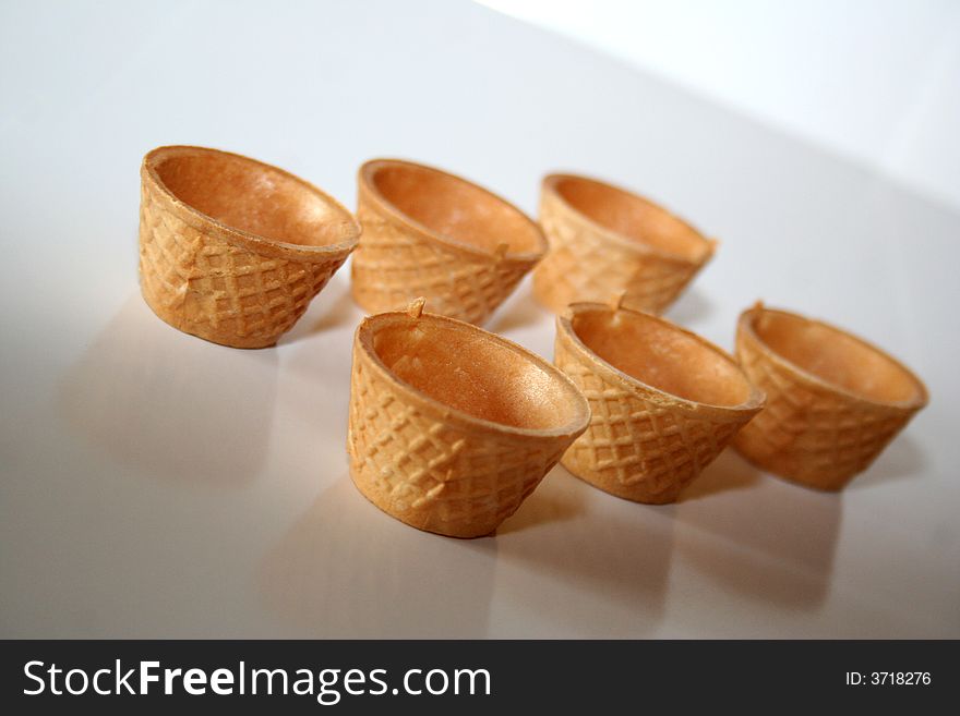 Small glasses of crispy wafer for drinking alcohol /  Six in series