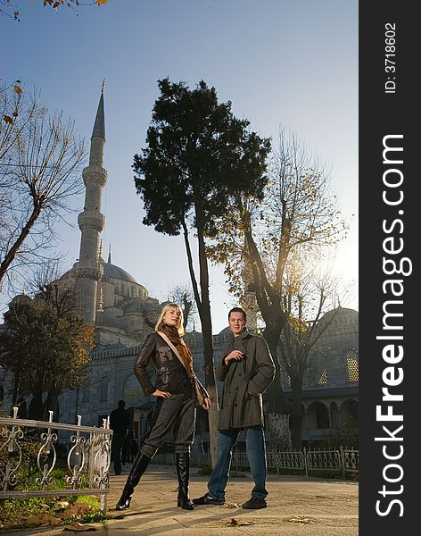 Attractive caucasian couple in front of famous Blue Mosque (Istanbul, Turkey). Attractive caucasian couple in front of famous Blue Mosque (Istanbul, Turkey)