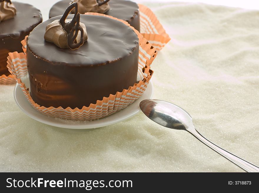 Three chocolate cake on sugar