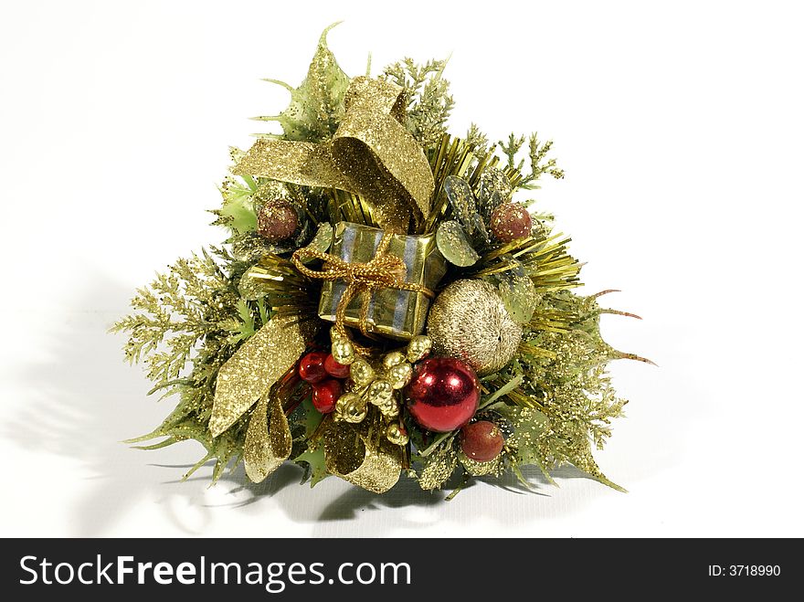 A beautiful simple green and red chaplet christmas decoration islolated on white background