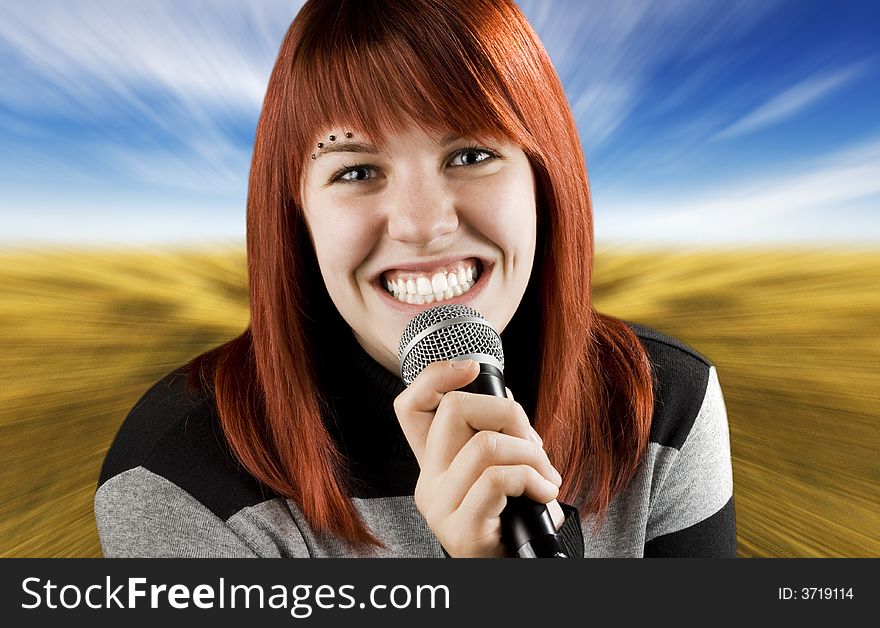 Joyful girl singing on the karaoke