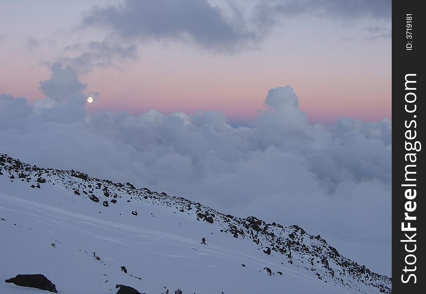 The moon above mountains