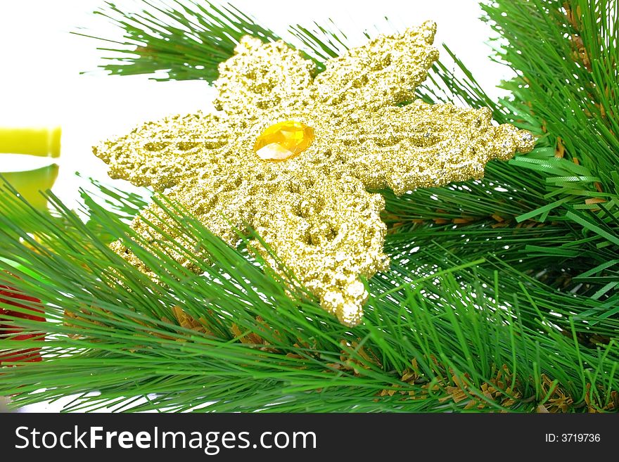 Christmas ornaments,yellow snow flake,fir-tree.