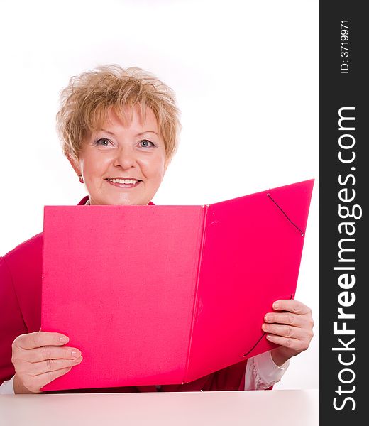 Attractive mature woman holding a pink folder. Attractive mature woman holding a pink folder